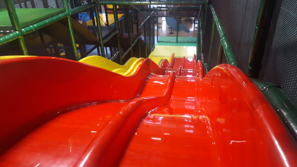 We bet our red and yellow racing slides will make you laugh as much as your kids.
